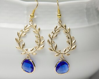 Gold and blue earrings. Blue glass earrings. Gold laurel earrings. Framed Glass earrings. Glass dangle earrings. Cobalt Blue earrings.