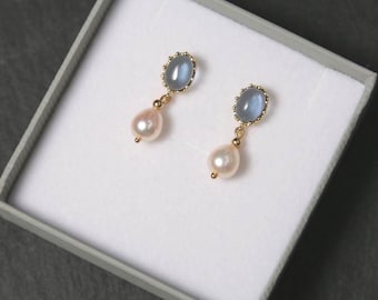Dusty blue and gold glass stud earrings with freshwater pearls.