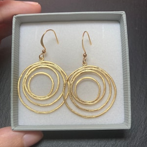 Gold circle earrings. Gold hoop earrings.