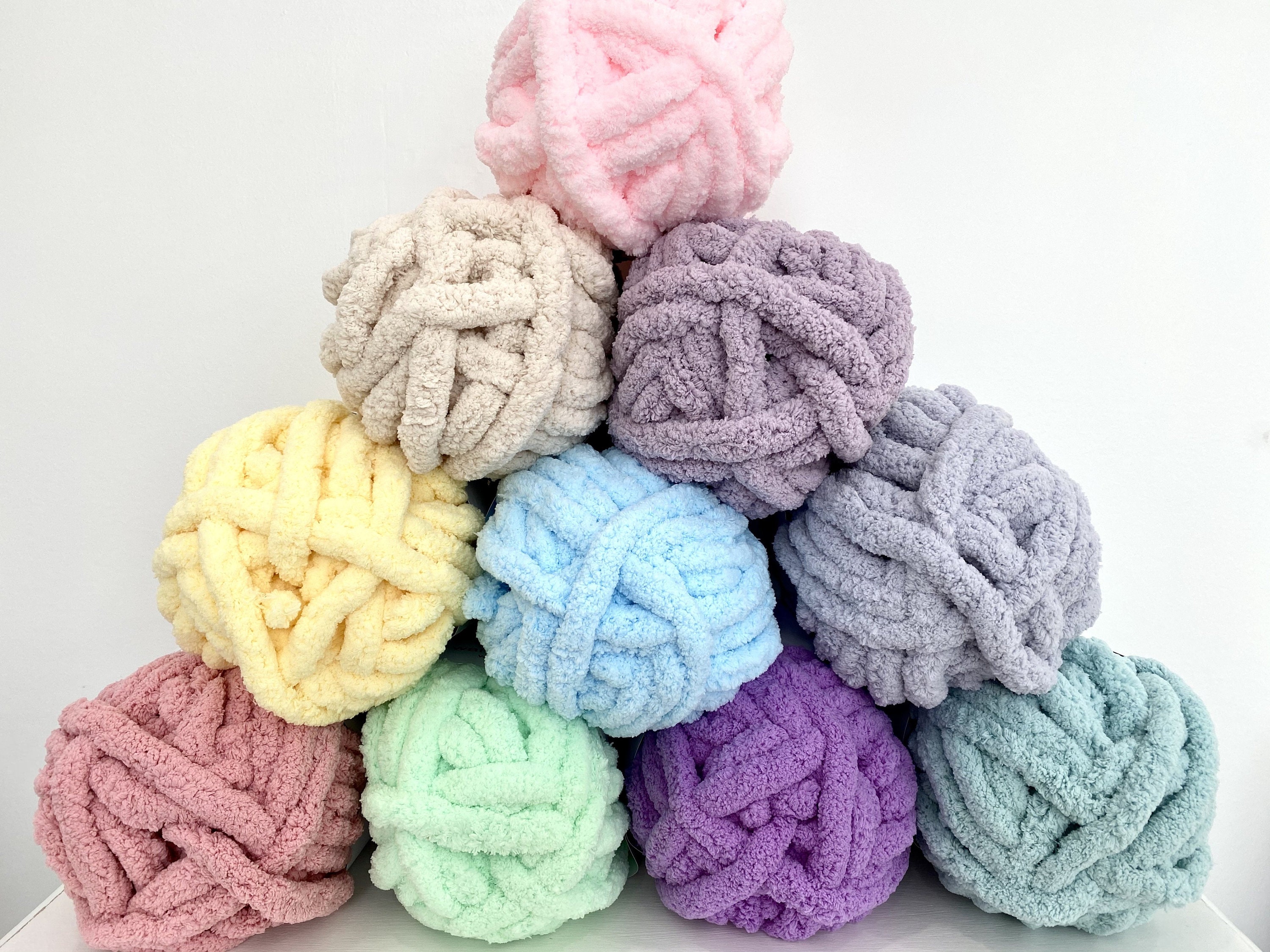 Hand knitted chunky throws. Yarn is Yarn Bee, Eternal Bliss. Hand