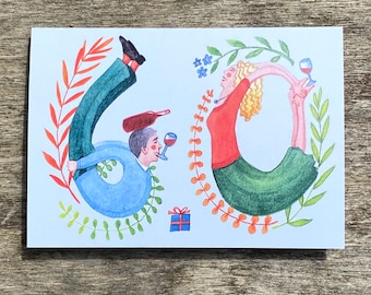 May include: A greeting card with a watercolor illustration of two people forming the number "60" with their bodies. The woman is wearing a red shirt and a green skirt, and the man is wearing a blue shirt and green pants. Both are holding glasses of wine. The card has a blue background with green and orange floral accents.