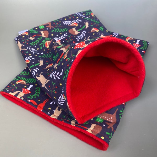 Navy festive party animals snuggle sack or snuggle pouch. Fleece lined sleeping bag for hedgehogs, guinea pigs and small animals