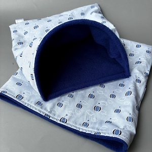 Saco de dormir grande con forma de globo aerostático y animales. Saco de dormir para cobayas.