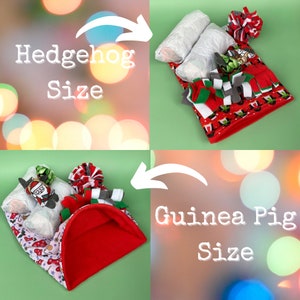 May include: Two red and white Christmas-themed pet beds, one for a hedgehog and one for a guinea pig. The hedgehog bed is smaller and has a Santa Claus toy inside. The guinea pig bed is larger and has a red fleece lining.