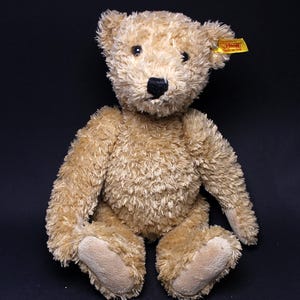 Vintage Steiff Teddy Bear: Golden Brown Plush Toy with Glass Eyes