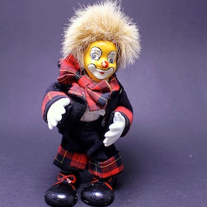 Vintage Porcelain Clown Doll: Hand-Painted Harlequin, Sand Filled
