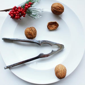 Vintage Scandinavian Metal Nutcracker: Folk Art Kitchen Tool