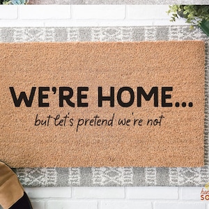 Funny Introvert Doormat – We&#39;re Home But Let’s Pretend We’re Not – Sarcastic Front Porch Mat