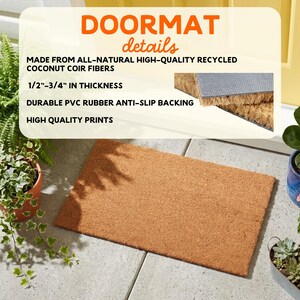 a door mat made from all-natural high-quality recycled coconut coir fibers, with a thickness of 1/2" to 3/4" and a durable vinyl rubber anti-slip backing. The mat is designed for high-quality prints, and it is placed on a concrete floor next to a potted plant.
