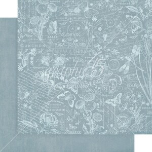 May include: A blue and white patterned paper with a floral theme. The paper features butterflies, flowers, and text in French. The text includes "Floral Treasures", "Conservatoire Botanique", and "Rose Angler a Grasse".