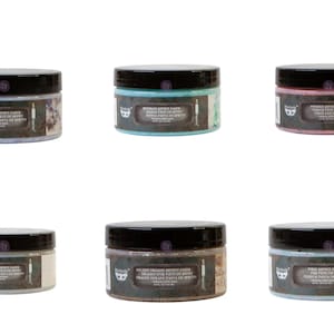 May include: Six jars of  "Dixie Belle"  "Muddy  Effect Paste" in various colors:  white, light blue, pink, gray, teal, and light blue with glitter.  Each jar has a black lid with a white Dixie Belle logo.
