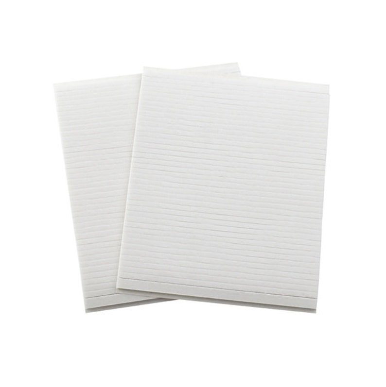 May include: Two white sheets of paper with lined edges.