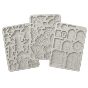 May include: Three silicone molds for baking or crafting. The molds feature various fairy garden themed designs, including mushrooms, houses, flowers, doors, and windows.
