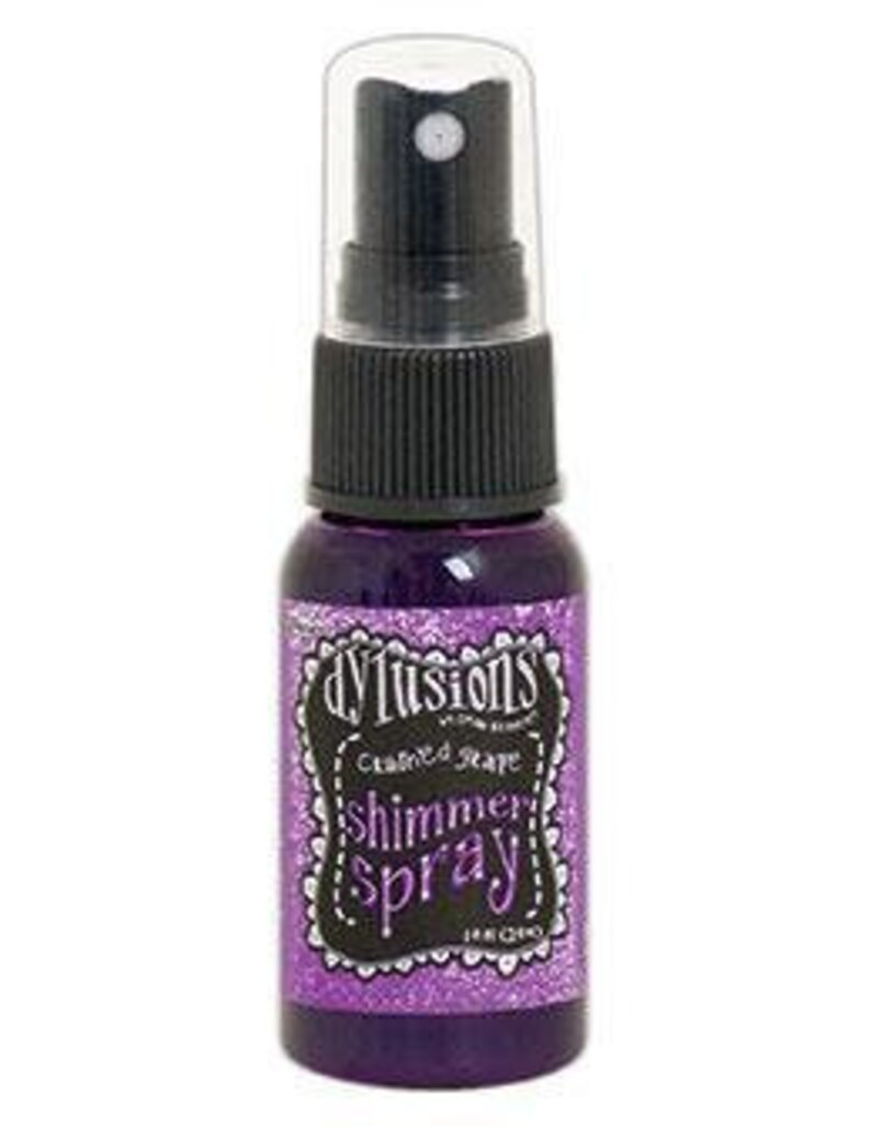 May include: A small bottle of purple shimmer spray with a black cap and label that reads "dylusions  Crafted Stave Shimmer Spray  Ink-Crado".
