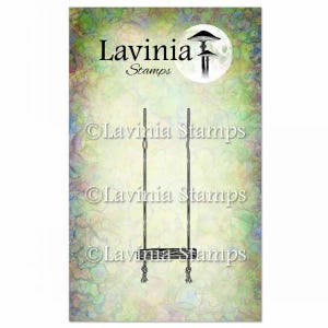 May include: A whimsical illustration featuring a swing with ropes, a mushroom, and a full moon. The text "Lavinia Stamps" is at the top. The background has a watercolor effect with shades of green, purple, and yellow.
