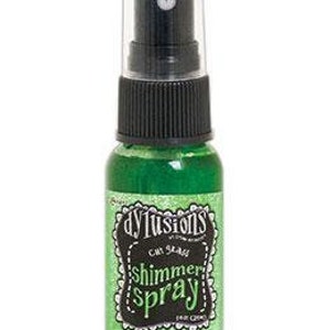 May include: A small green bottle of Dyalusions Shimmer Spray with a black spray nozzle. The bottle has a white label with black text that reads "Dyalusions Shimmer Spray" and "Sea Green".