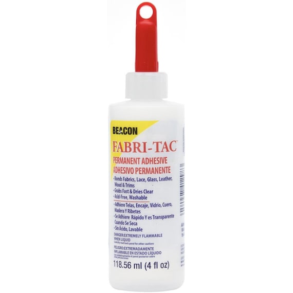 Fabri-Tac Adhesive. Clear drying permanent glue - 4 oz bottle