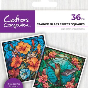 May include: A package of 36 stained glass effect squares for craft applications. The squares feature two designs: a hummingbird in a floral wreath and a bouquet of orange and blue flowers. The package states that there are 12 beautiful acetate designs, 3 of each.