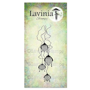 May include: A vertical card with a watercolor background in shades of green, blue, and yellow. The card features the text "Lavinia Stamps" and a black and white illustration of a mushroom and hanging floral-like shapes.