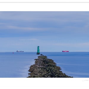 North bull Lighthouse Dublin Bay. View out to boats on the horizon of Dublin Bay. Bull Wall Photograph