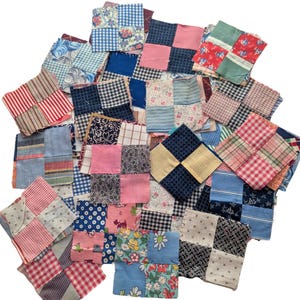 May include: A collection of square fabric patches, each composed of four smaller squares sewn together. The patches feature a variety of patterns including gingham, floral prints, stripes, polka dots, and solid colors in shades of blue, pink, red, and white.