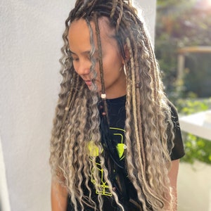 Wild and free,Synthetic Dreads, dready waves,light brown and dirty blonde dreadlocks with accessories,feathers,pendants,boho hair