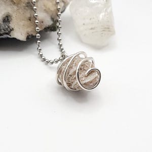 desert rose selenite necklace wrapped in silver wire on silver ball chain side view