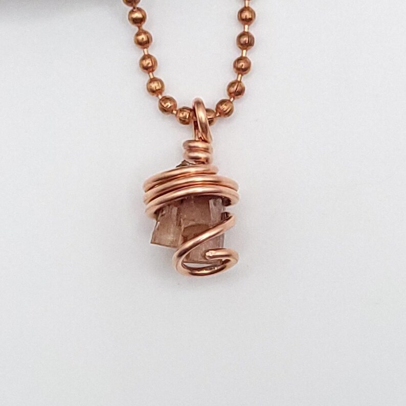raw aragonite necklace in copper wire with a copper ball chain up close