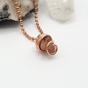 raw aragonite necklace in copper wire with a copper ball chain side view