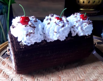 Handmade crochet cake handbag purse.  Swiss roll, chocolate log, cream and cherries