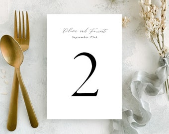 Simple Table Numbers Template | Classic Black and White Wedding Table Numbers your can edit online with Templett | Olivia