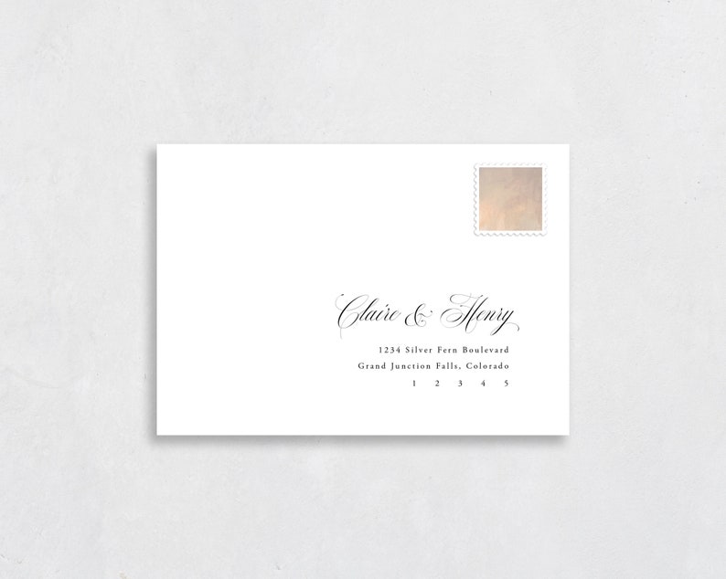 May include: White envelope with a decorative stamp in the upper right corner. The envelope is addressed to Claire & Henry, 1234 Silver Fern Boulevard, Grand Junction Falls, Colorado.