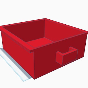 May include: A red plastic drawer with a small handle on the front. The drawer is empty and has a square shape.
