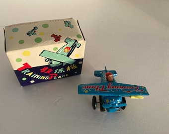 Vintage Tin Wind Up Training Plane Airplane with Great Graphics MS 011 Airplane Wind Up Toy