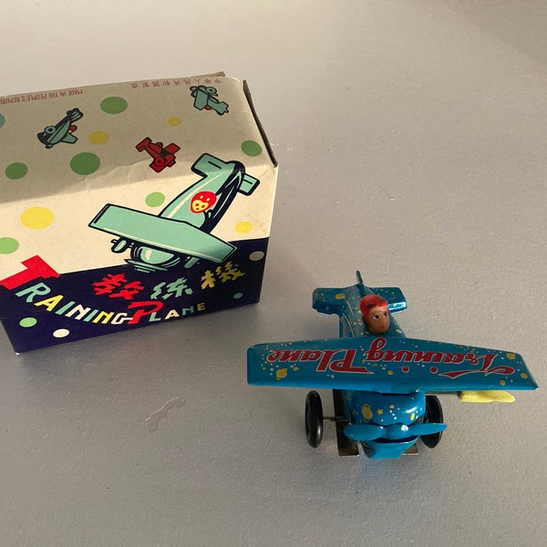 Vintage Tin Wind Up Training Plane Airplane with Great Graphics MS 011 Airplane Wind Up Toy