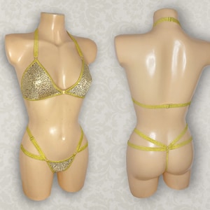 Sutiã triangular com lantejoulas e calcinha fio dental com tiras, modelo Starlight Burlesque Stripper (vendidos separadamente ou em conjunto).
