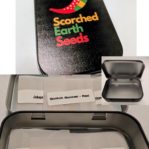 May include: A black rectangular metal tin featuring a chilli pepper graphic and the text Scorched Earth Seeds. Inside are several translucent envelopes labelled with names like Scotch Bonnet - Red and Mystery Seeds, containing various seeds.