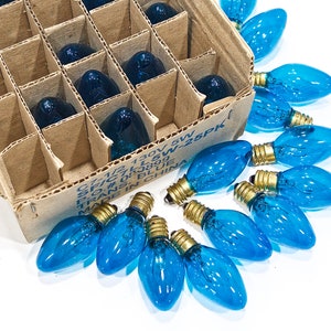 VINTAGE: Box of 25 Translucent Blue Bulbs C7 1/2 130V 5W Candelabra Base Bulbs Christmas Tree Bulb Replacements SKU 25-B-00006907 image 1