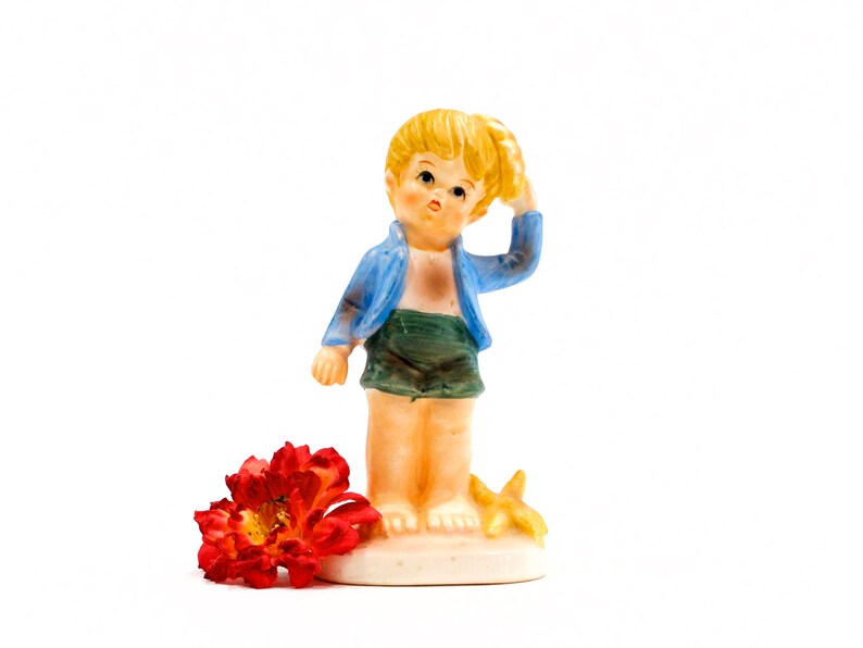 VINTAGE: Flambre Collector's Choice Series Ceramic Figurine Boy Holding Shell on Head Collectable SKU 23-D-00014185 image 1