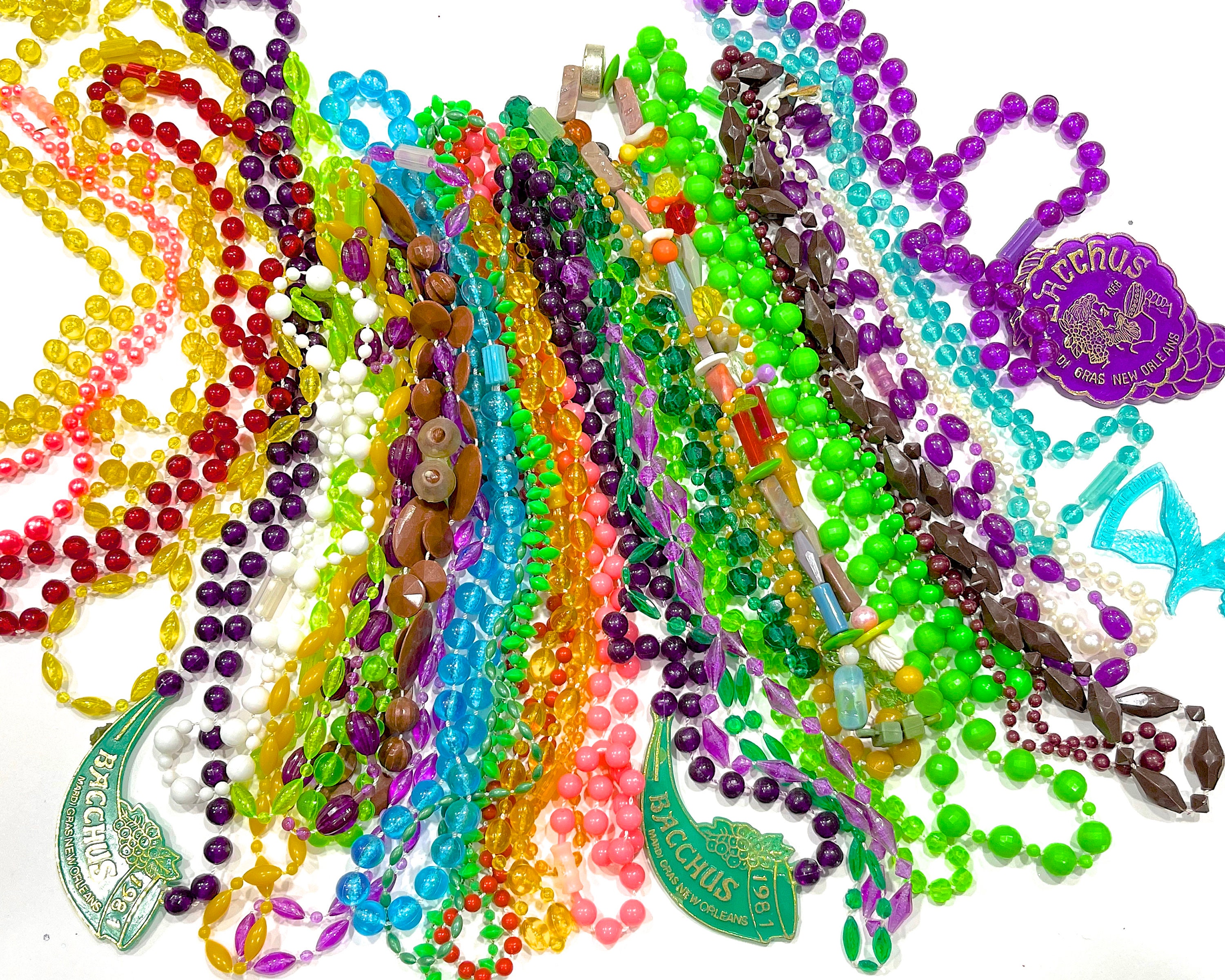 From Glass to Plastic: A (Brief) History of Mardi Gras Beads - The New  Orleans 100