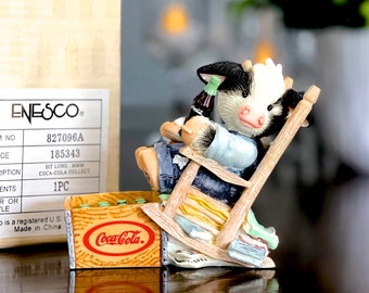 VINTAGE: 1990s - Enesco Mary's Moo Moos Figurine in Box - Coca Cola "Sit Long, Laugh Often, Drink Coke" - Collect - NIB - SKU 35-E-00035416