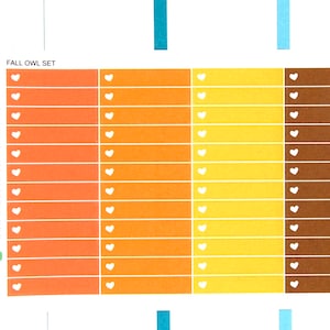 May include: A planner page with a set of fall-themed stickers. The stickers are orange, yellow, and brown with white hearts. The text "FALL OWL SET" is at the top of the page.