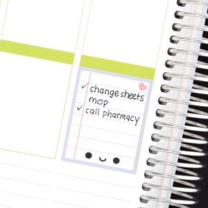 May include: A purple and white planner page with a checklist on a sticky note. The checklist includes the items "change sheets", "mop", and "call pharmacy".