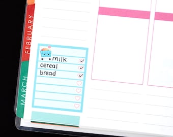 May include: A blue checklist sticker with a cartoon shopping cart and the words "milk", "cereal", and "bread". There are checkmarks next to "milk" and "cereal" and a heart next to "bread".