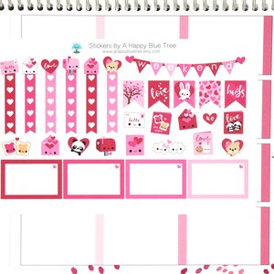 May include: A set of Valentine's Day themed stickers featuring hearts, banners, and cute illustrations. The stickers include phrases like "love", "hugs", and "weekend".