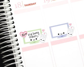 May include: A planner page with two stickers. The first sticker is green and has a cartoon television with the text "8pm big bang theory!" and a pink heart. The second sticker is blue and has a cartoon television with a pink heart and a remote control.