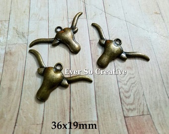 ESC-WC63: Antique Brass Bull Head Pendants (6pcs)