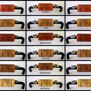 May include: A set of 6 wine cork cabinet knobs in various wood stain colours, including cherry, oak, mahogany, walnut, espresso, and natural. Each knob features a detailed grapevine design and a silver-toned metal accent.