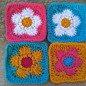Patrón cuadrado de abuela con flor de margarita y crochet
