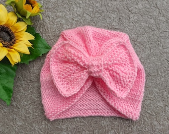 Strickmütze für Babys mit Schleifenmuster